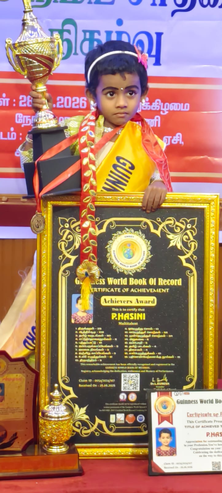 P. Hasini holding her official Guinness certificate